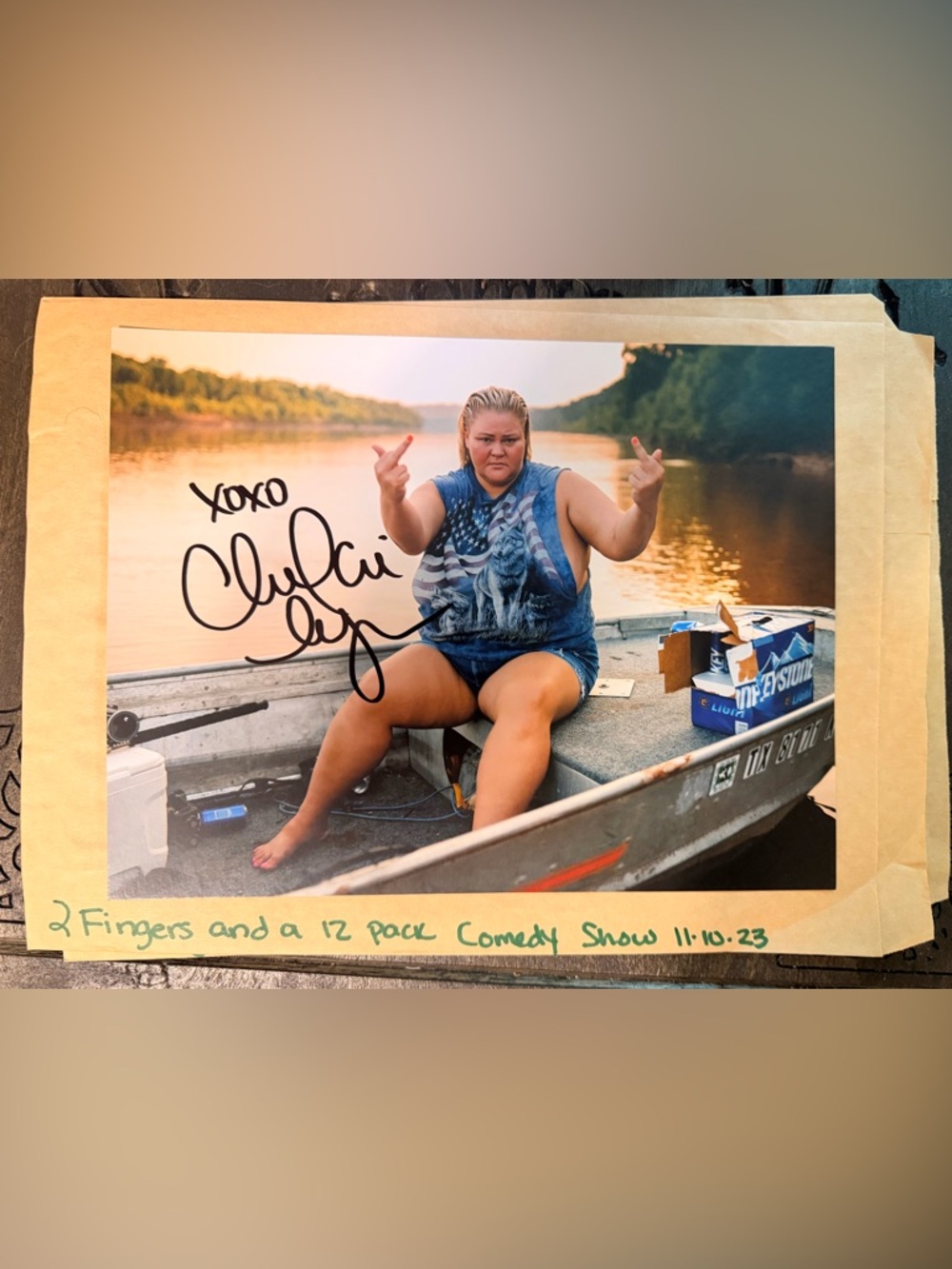 Signed Photo of Comedian Chelcie Lyn in Boat - Blue Tank Top